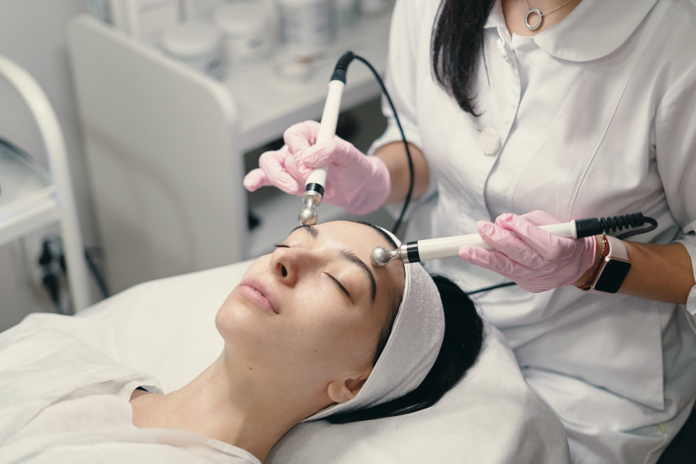 Woman receiving a personalized skincare treatment at an aesthetic clinic